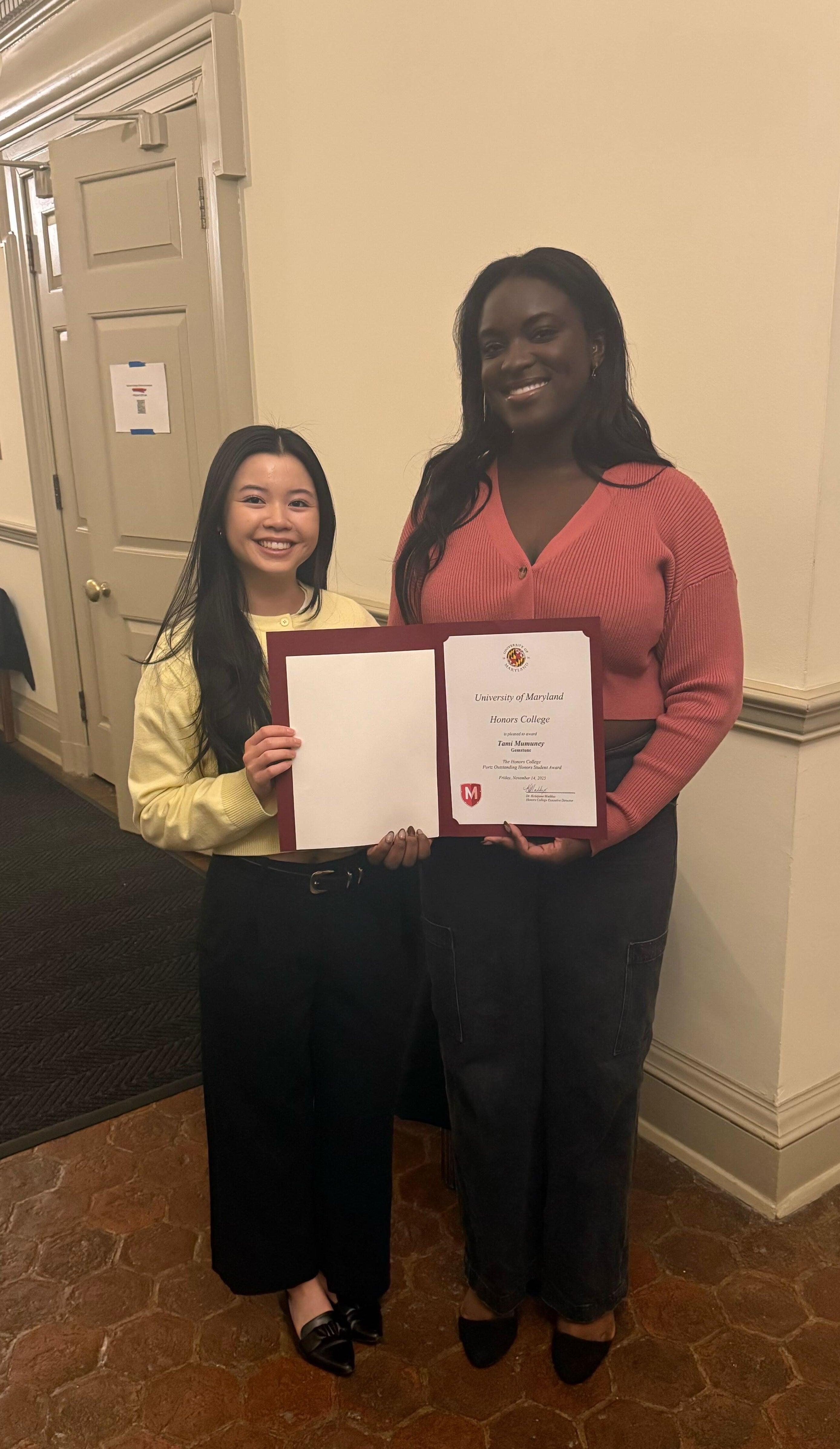 Tami Mumuney and Jannelle Dang holding Portz Award