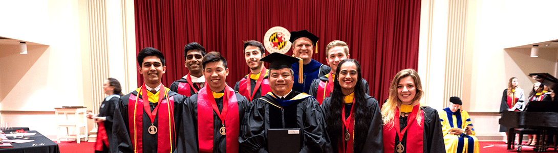 group of graduates in cap and gown