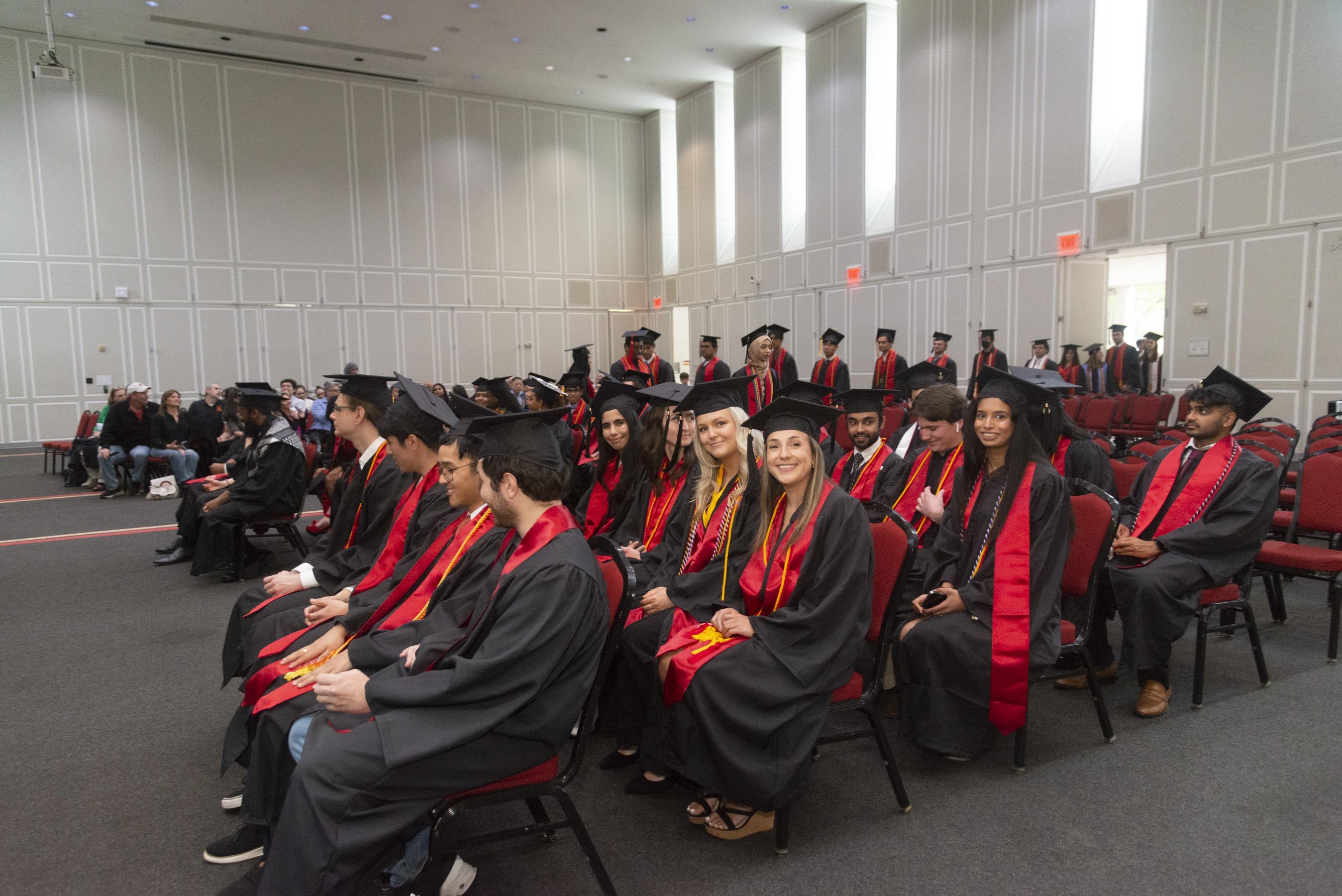 Gemstone students seated in rows at graduation ceremony