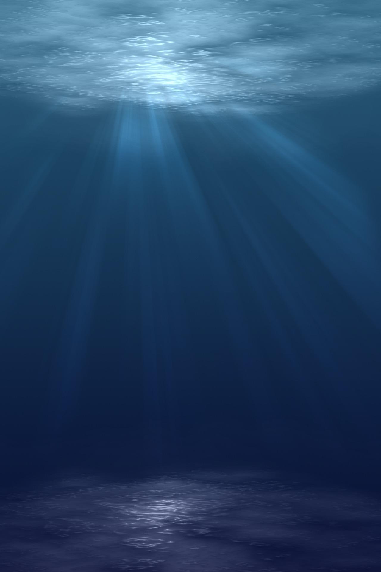 Image of sunlight shining through ocean surface