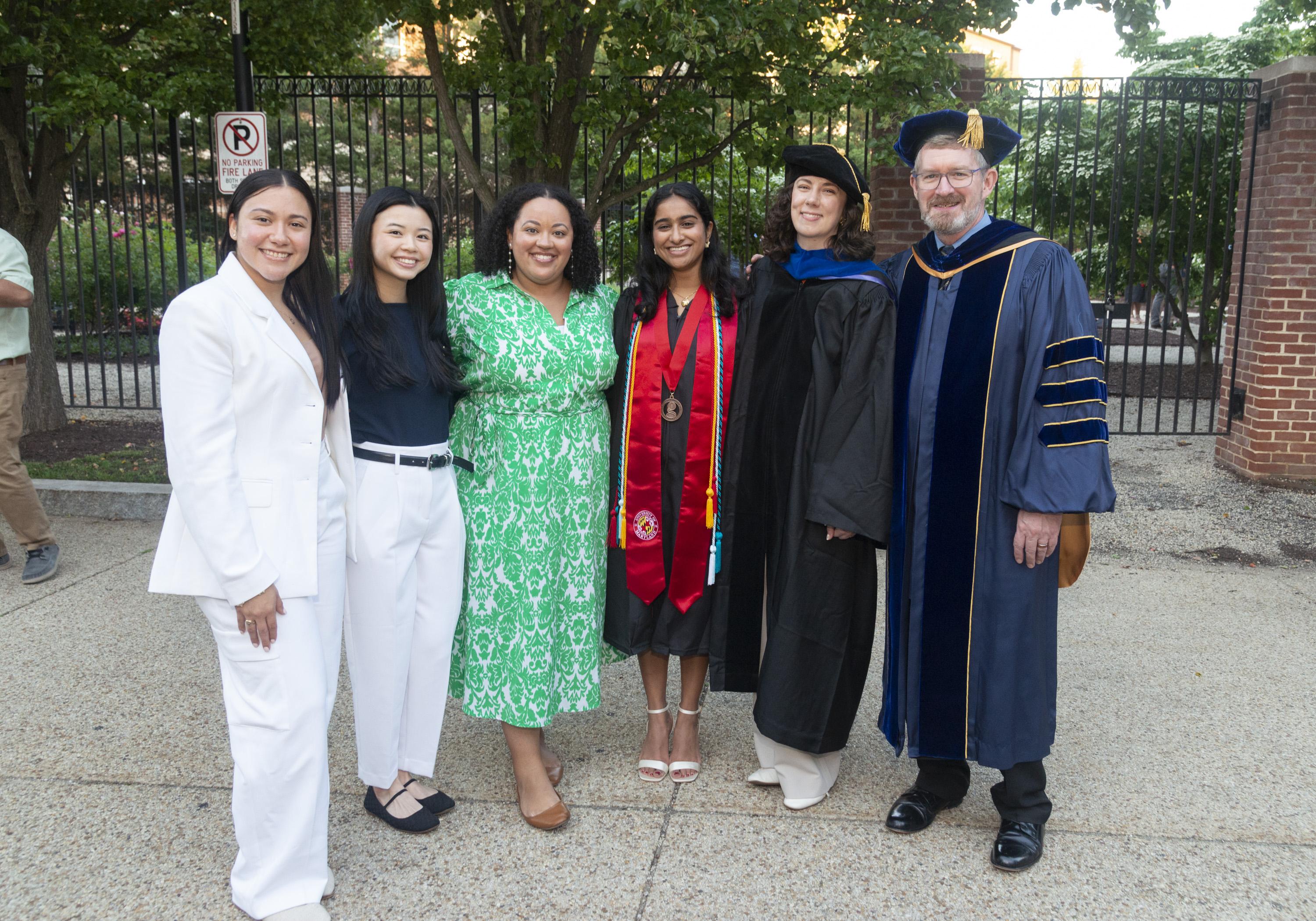 Gemstone staff taking photo with Gemstone student Annette Eldo