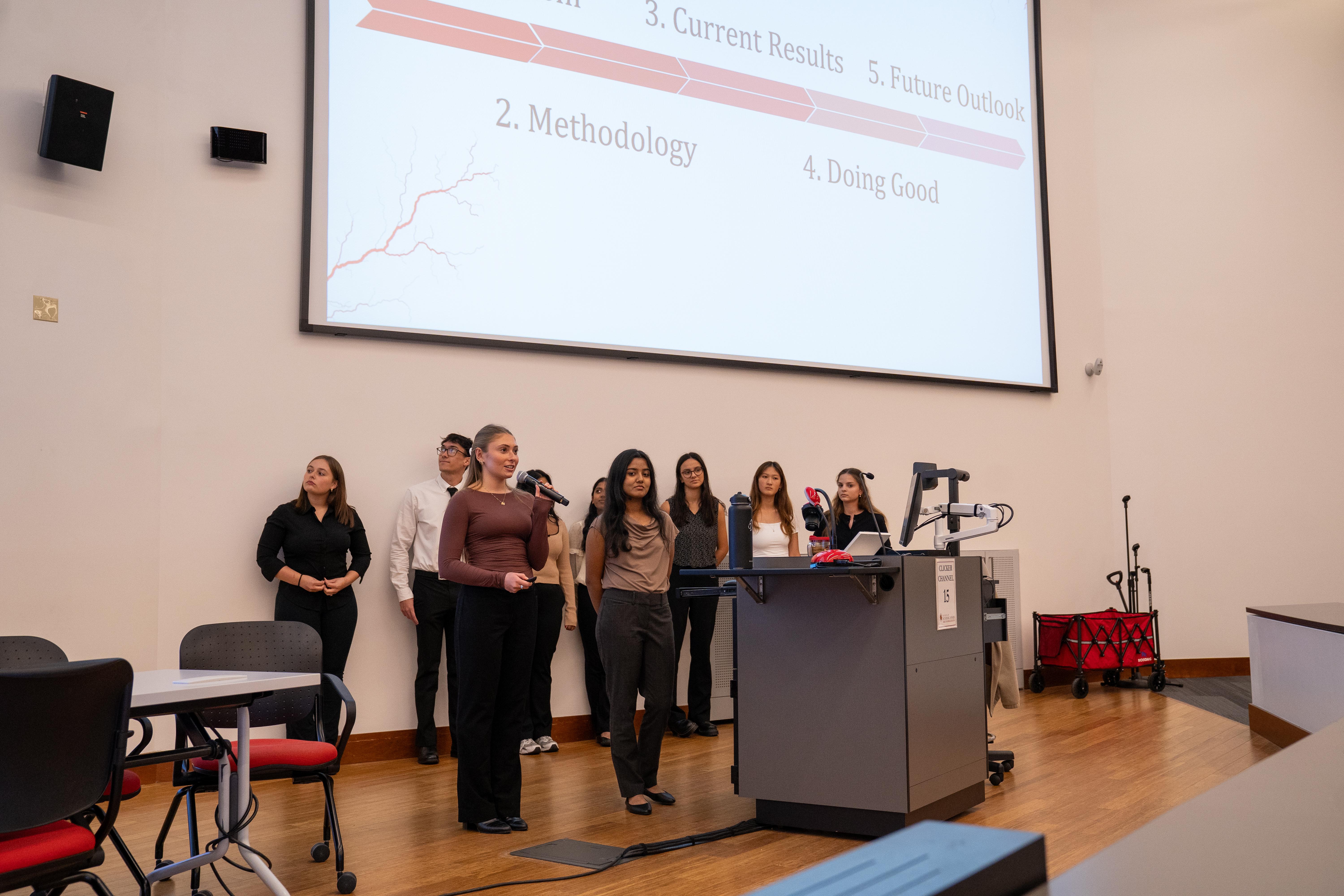 Gemstone students presenting slideshow