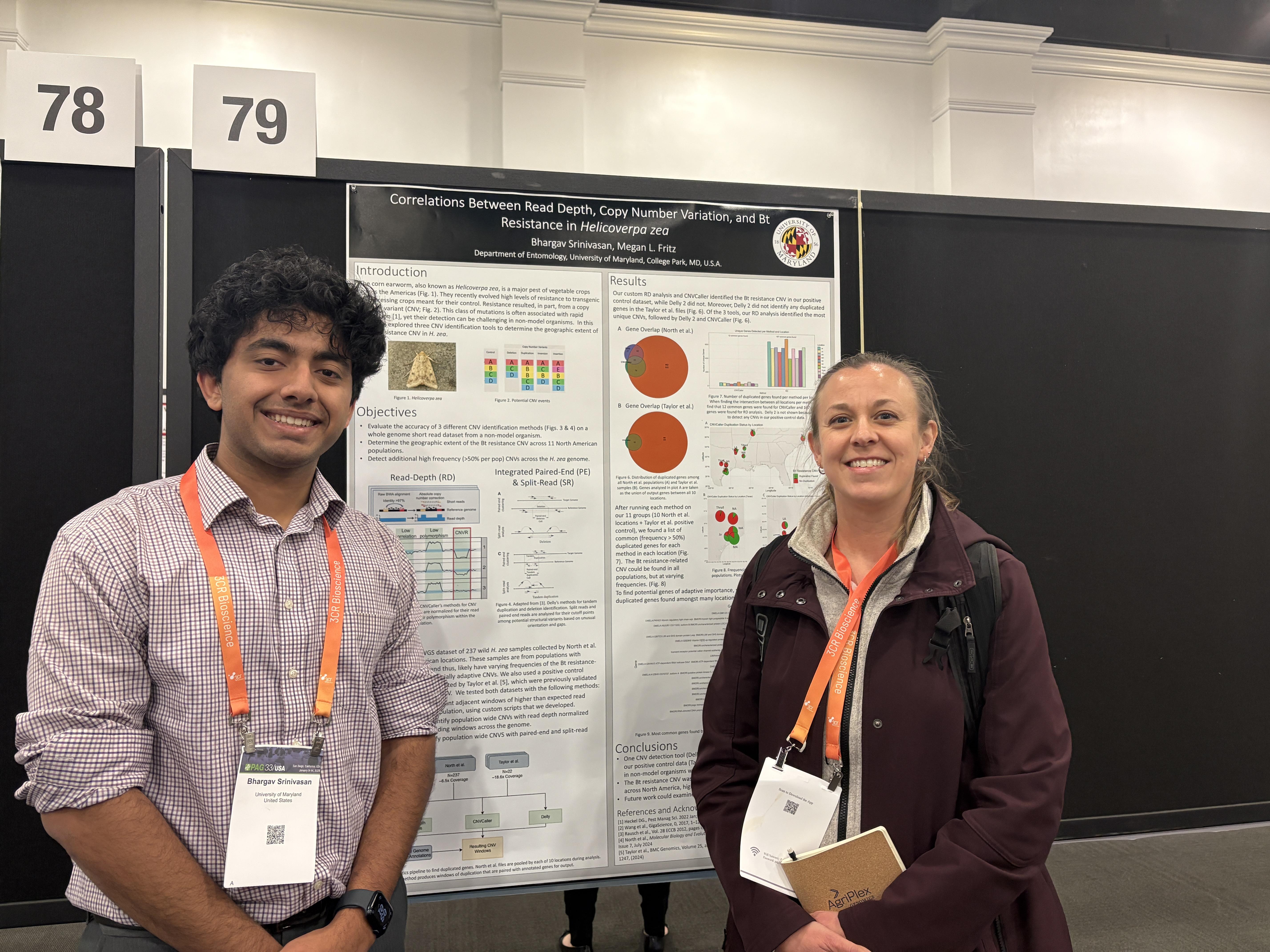 Bhargav and Dr. Megan Fritz standing in front of a conference poster board