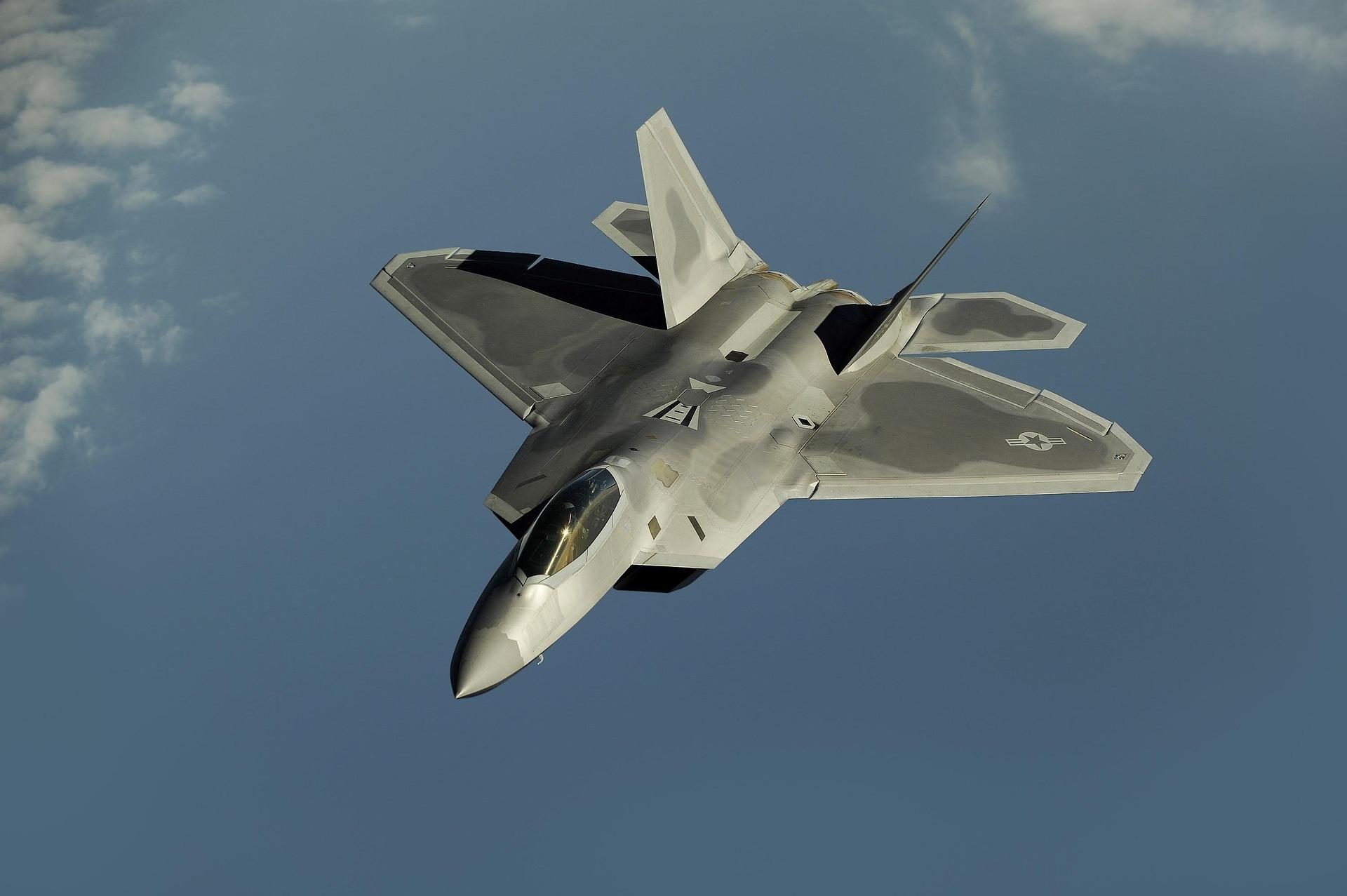 White aircraft in a blue sky